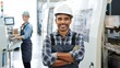 © Aliaksandr Barouski - Smiling male and female workers in a manufacturing facility, showcasing teamwork