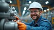 © Viktor - Happy engineer in hard hat works with industrial machinery. Smiling technician inspects equipment at factory. Professional worker repairs pipeline system at plant. Confident man satisfied with job at