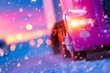 © A10zon Studio - Semi truck driving in snowstorm harsh winter logistics transportation highway scene