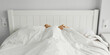 © rohappy - Healthy sleep, woman lying in bed under white blanket hiding her face in bedroom at home