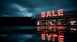 © Jordi - Black Friday sale sign reflected in water at night