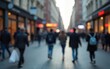 © Zoe - A blurry image of a city street with people walking. High quality