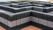 © Eg - Recycled Material Maze Walls with Textured Surfaces and Earth Tones