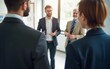 © Julian - Business networking event. Business people gathering in office. Blurred background. High quality