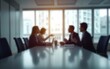 © Julian - Office blur meeting room blurred background of blurry boardroom interior with work desk table for business people team discussion corporate conference enterprise seminar : Generative AI. High quality