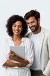 © Iryna - Young multi-ethnic couple smiling with tablet against a white background