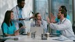 © Yuliia - Stressed arguing diverse five people multiethnic group of doctors medical students interns debate discuss quarrel about health examination diagnosis diagnostic team brainstorm at meeting room hospital