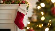 © Md - Cozy christmas stocking hung on a fireplace mantle beside a decorated tree with twinkling lights