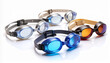 © teguhiman - Set of Four Swimming Goggles in Various Colors on a White Background