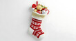 © MDHASIBULHASAN - Festive christmas stocking filled with toys and candy canes