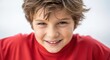 © photoplotnikov - Smiling caucasian boy in red shirt