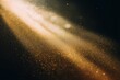 © EdvvinStudios - Golden glitter dust particles sparkling in light beam