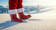 © MrLynx - Santa's boots standing on snow in winter mountain landscape