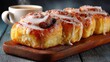© Luba - Fresh cinnamon rolls with icing and cup of coffee