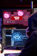 © DC Studio - Hacker in secret hideout getting critical error warning while doing computer sabotage with AI. Rogue engineer seeing failure alert while trying to penetrate firewalls using neural networks