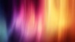 © NingPhattraphorn - A vibrant abstract image featuring smooth, flowing gradients of purple, pink, orange, and yellow hues, blurred rainbow background