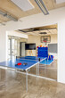 © Westend61 - Table tennis in modern office
