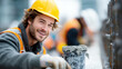 ©  VladaToday - Construction worker adjusting rebar with gloved hands for building project safety and precision