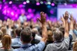 © YouraPechkin - Crowd of participants raising hands during an interactive conference session