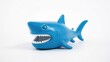 © TheWaterMeloonProjec - Children's toy shark, playful design with open mouth, safe for imaginative play