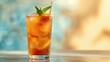 © TheWaterMeloonProjec - A refreshing glass of iced tea contrasted with a soft, blurred background, ideal for editorial layouts