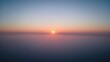 © vxnaghiyev - Abstract aerial view showing a serene gradient at sunrise over a body of water, featuring only the sky and water in a tranquil setting.