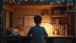 © miss irine - Boy studies late at night in cozy room. Kid does homework at desk under lamp light. Pupil reads book in home interior with bookcase. Child learns sitting indoors in evening.