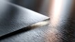 © Milagro - Close-up of a metal surface showcasing fine details and textures, highlighting its reflective properties and industrial design.