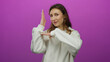 © Krakenimages.com - Woman gesturing playfully against vibrant pink background wearing white sweater with relaxed hairstyle and cheerful expression conveying positivity and youthful energy.