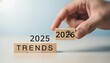 © Aftarun - Hand changing wooden blocks from 2025 to 2026, symbolizing future trends and upcoming changes in the new year