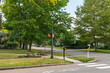 © woodsnorth - An intersection in a residential area in Warren, Pennsylvania, USA on a sunny summer day