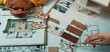 © InfiniteFlow - A vibrant workspace showcases hands selecting design samples from a mood board, emphasizing creativity in home renovation planning with sketches and materials. SACTR