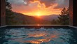 © Pete - Outdoor spa pool with clear water reflects orange sunset. Mountains covered by forest are on horizon. Calm spa resort pool in nature for health vacation. Relaxation in hot tub at sunset.