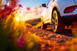 © A10zon Studio - Modern hatchback driving on countryside road compact efficient mobility