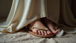 © AlenaSi - Feet and hem of dress shown, an elegant scene from the Bible, sandals and skin visible. Scene from the Bible, feet in sandals, white gown, feather, and gentle tone communicate purity.