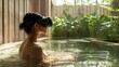 © Tri - Woman Wearing Virtual Reality Headset Immersed in Warm Water Amidst Lush Greenery Natural Light Illuminates Serene Spa Environment