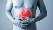 © Bonek - Man experiencing stomach pain with highlighted digestive system anatomy.