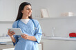 © Pixel-Shot - Female doctor with tablet computer in clinic