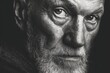 © Iftikhar alam - Expressive monochrome portrait of an old man showcasing deep emotions and character in a timeless setting