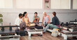 © Malik25/peopleimages.com - Woman, friends and happy with talk at pilates class, listen and laugh with conversation at gym. People, group and smile with memory, chat or funny story for bonding, fitness and wellness at club
