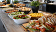 © Oleksiy - Corporate Lunch Catering : A professional, modern office lunch spread with sandwiches, salads, and finger foods