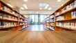 © Kari - abstract blurred public library interior space blurry room with bookshelves by defocused effect use for background or backdrop in business or education concepts