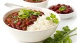 © Photo art - A comforting indian meal of kidney bean curry rajma served with fluffy basmati rice, garnished with fresh cilantro and green chilies, presented in a white bowl and isolated on a white background