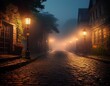 © Jenna - a foggy cobblestone street at night illuminated by old fashioned street lamps creating an eerie scene
