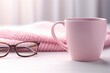 © aparna - Pink Knitted Mug and Eyeglasses on a Desk