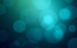 © nian - Cool blue green background created in camera with a macro lens with overlapping bokeh circular shapes soft edges light and dark areas with room for copy and text. High quality