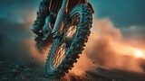 A motocross bike speeds across a dusty track at sunset, its wheels kicking up dirt and dust in a dynamic display of speed