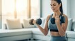 © Volha - Woman lifting dumbbells during home fitness workout