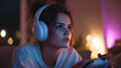 © Primex Legacy - Immersive gaming lifestyle of young woman with headphones in ambient room play video game focused expression