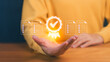 © ParinPIX - Person hand showing a digital icons of certificates, checklists, and a quality badge. Symbolizing certification, testimonial, compliance, digital credentials, and professional standards verification.